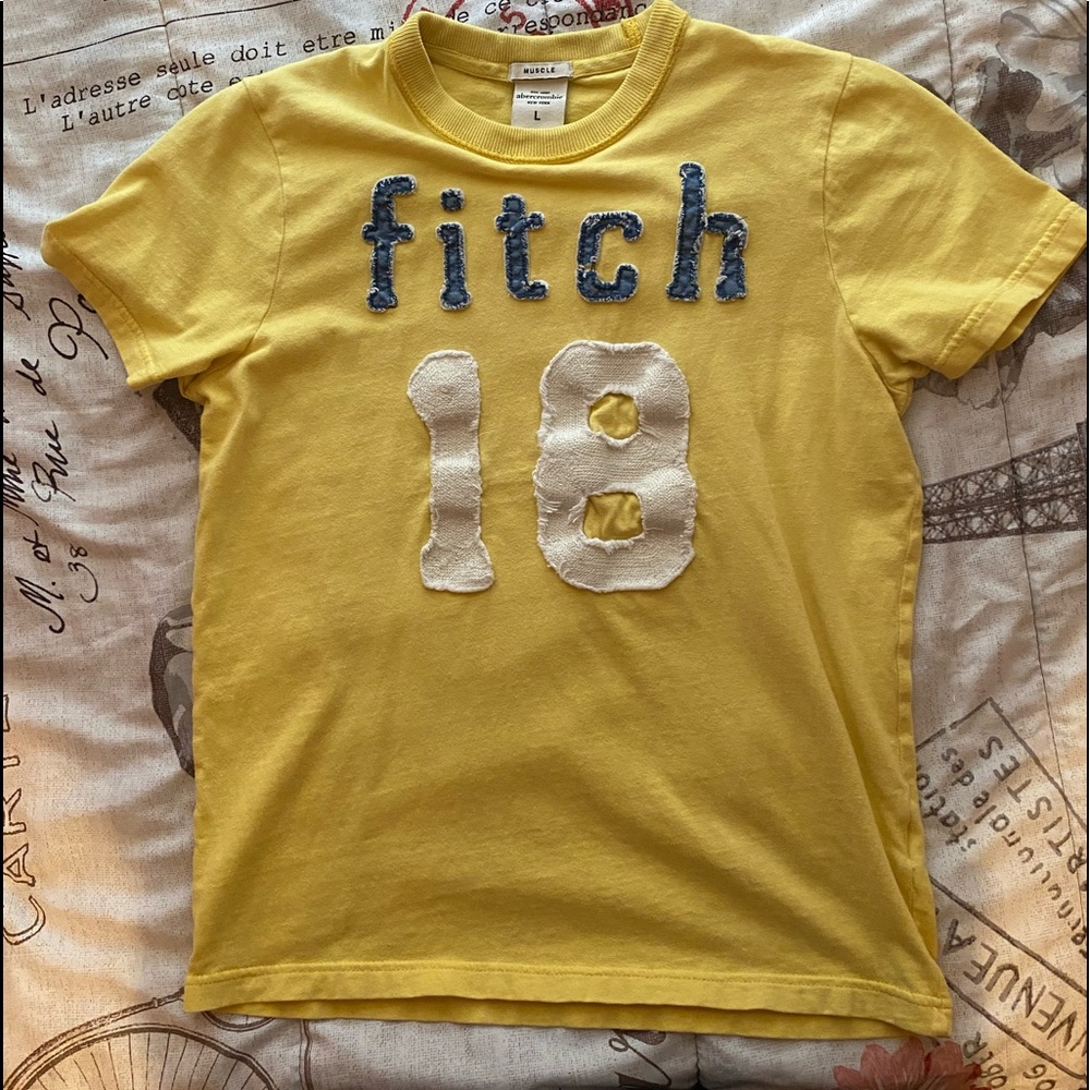 Yellow Abercrombie Kids shirt